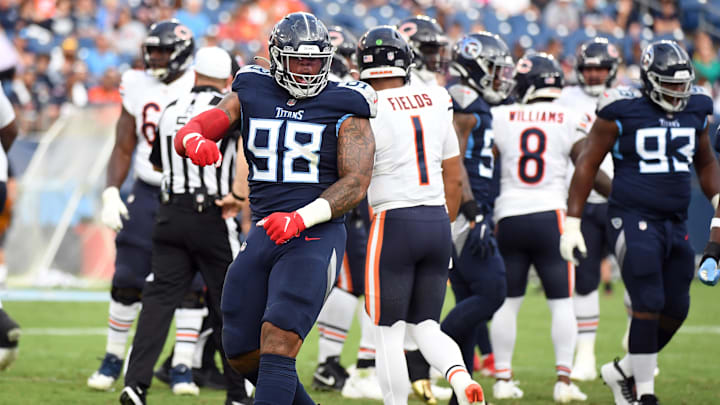 Tennessee defensive tackle Jeffery Simmons celebrates after a fourth-down stop in a 2021 preseason game against the Bears.