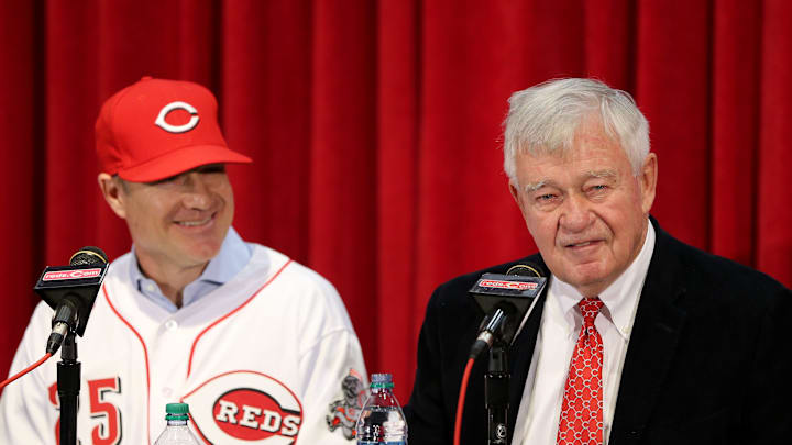 David Bell, left, who is a Cincinnati native and Moeller High School alumnus, smiles toward Reds CEO Bob Castellini, right, during his introduction as the team's field manager in 2018. David Bell, left, who is a Cincinnati native and Moeller High School alumnus, smiles toward Reds CEO Bob Castellini, right, during his introduction as the team's field manager in 2018.