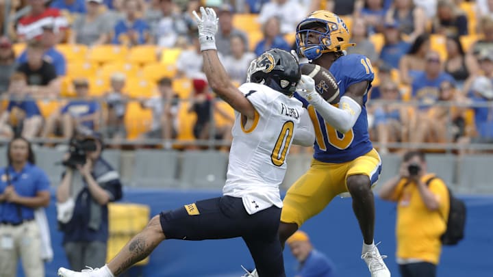 Aug 31, 2024; Pittsburgh, Pennsylvania, USA;  Pittsburgh Panthers defensive back Ryland Gandy (10) breaks up a pass intended for Kent State Golden Flashes wide receiver Luke Floriea (0) during the second quarter at Acrisure Stadium. Mandatory Credit: Charles LeClaire-Imagn Images