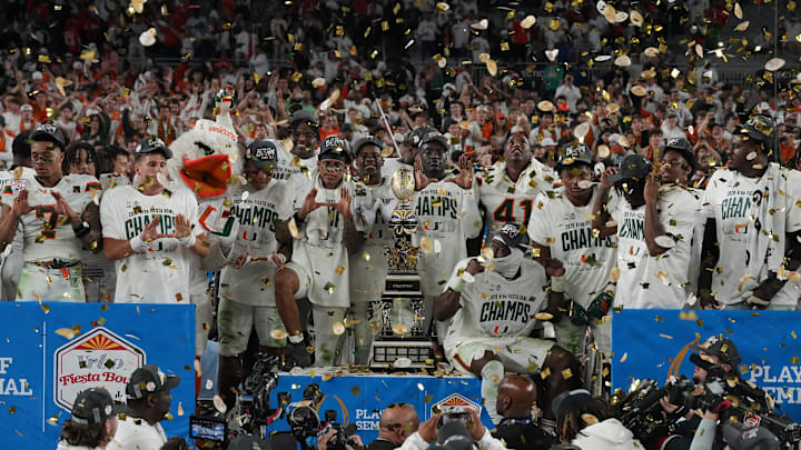 The Miami Hurricanes celebrate after winning the Fiesta Bowl and earning a berth in the College Football Playoff national championship game.