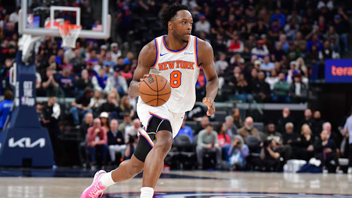 Knicks forward OG Anunoby dribbles the ball during a game.