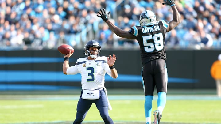Nov 25, 2018; Charlotte, NC, USA; Carolina Panthers outside linebacker Thomas Davis (58) jumps in front of Seattle Seahawks quarterback Russell Wilson (3) during the second quarter at Bank of America Stadium. Mandatory Credit: Jeremy Brevard-Imagn Images