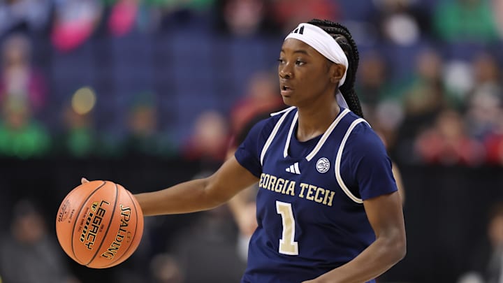 Mar 7, 2025; Greensboro, NC, USA;  Georgia Tech Yellow Jackets guard Chazadi Wright (1) dribbles the ball during the first quarter against NC State Wolfpack at First Horizon Coliseum. Mandatory Credit: Cory Knowlton-Imagn Images