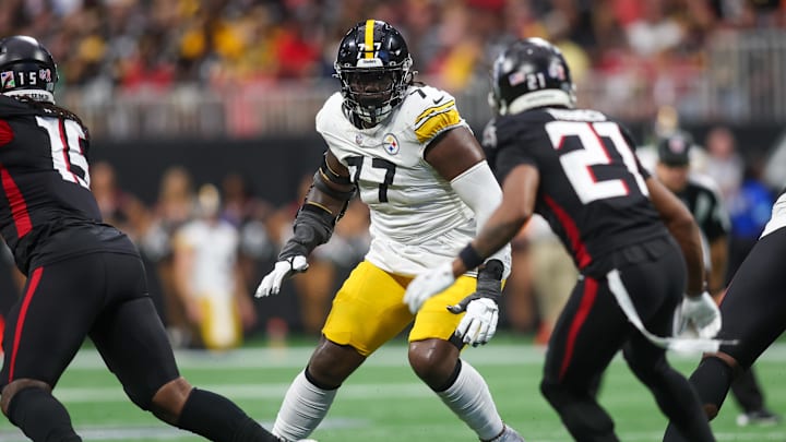 Sep 8, 2024; Atlanta, Georgia, USA; Pittsburgh Steelers offensive tackle Broderick Jones (77) blocks against the Atlanta Falcons in the fourth quarter