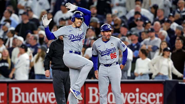 Oct 30, 2024; New York, New York, USA; Los Angeles Dodgers first baseman Freddie Freeman (5) celebrates after hitting a two-RBI single during the fifth inning against the New York Yankees in game four of the 2024 MLB World Series at Yankee Stadium. Mandatory Credit: Brad Penner-Imagn Images