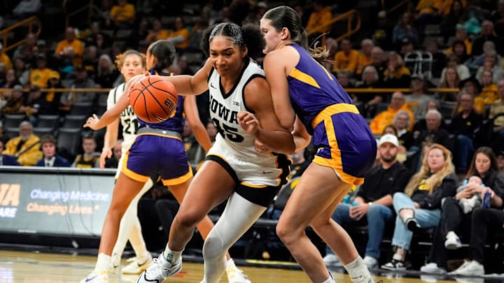 Iowa forward Hannah Stuelke (45) drives to the basket defended by Ashland forward Katelyn Harabedian (7) Oct. 30, 2025 during an exhibition game at Carver-Hawkeye Arena in Iowa City, Iowa. Iowa forward Hannah Stuelke (45) drives to the basket defended by Ashland forward Katelyn Harabedian (7) Oct. 30, 2025 during an exhibition game at Carver-Hawkeye Arena in Iowa City, Iowa.