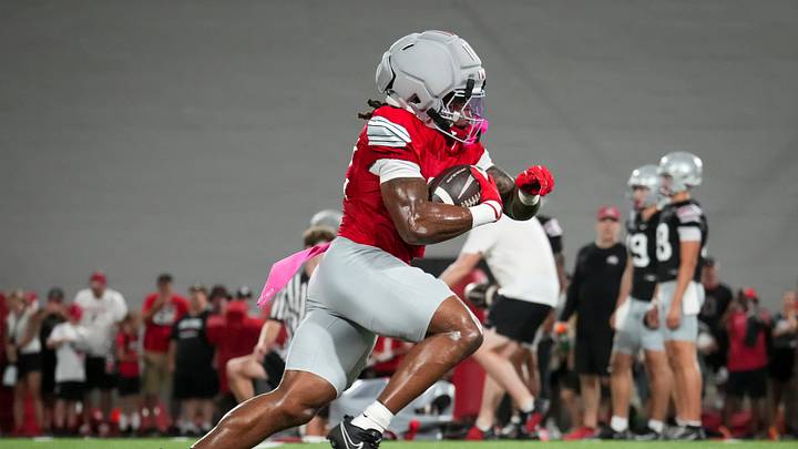 Ohio State Buckeyes running back Isaiah West (32) runs during football training camp inside the Woody Hayes Athletic Center in Columbus on Aug. 7, 2026. Ohio State Buckeyes running back Isaiah West (32) runs during football training camp inside the Woody Hayes Athletic Center in Columbus on Aug. 7, 2026.