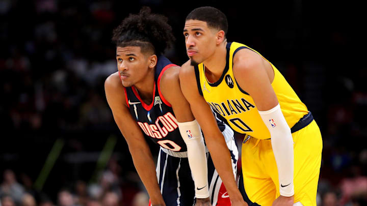 Mar 18, 2022; Houston, Texas, USA; Houston Rockets guard Jalen Green (0) and Indiana Pacers guard Tyrese Haliburton (0) look on during a free throw attempt during the second quarter at Toyota Center. Mandatory Credit: Erik Williams-USA TODAY Sports