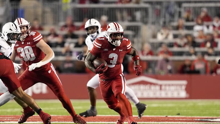 Wisconsin Badgers running back Tawee Walker (3) rushes with the football during the first quarter against the Penn State Nittany Lions at Camp Randall Stadium.