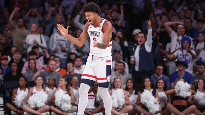 Dec 9, 2025; New York, New York, USA;  UConn Huskies forward Jaylin Stewart (3) celebrates in the first half against the Florida Gators at Madison Square Garden.