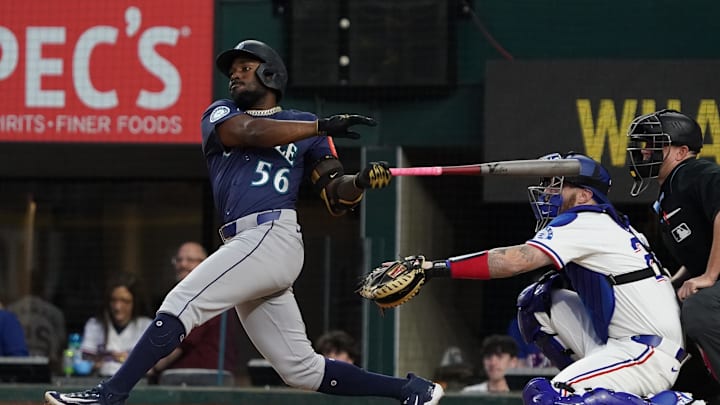 Seattle Mariners outfielder Randy Arozarena (56) hits a single during the eighth inning against the Texas Rangers at Globe Life Field on May 3.