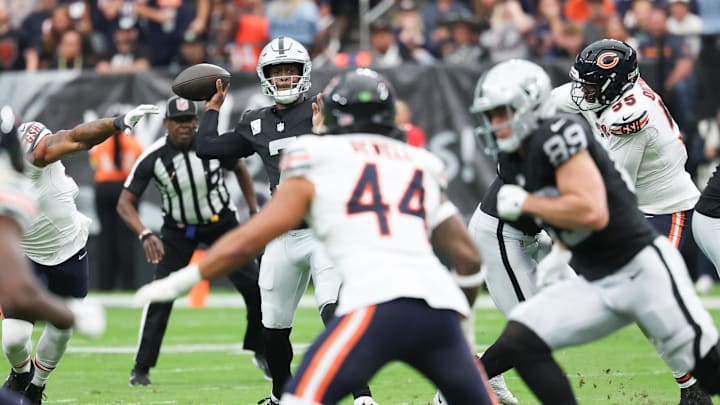 Sep 28, 2025; Paradise, Nevada, USA; Las Vegas Raiders quarterback Geno Smith (7) throws the ball during the first quarter against the Chicago Bears at Allegiant Stadium. Mandatory Credit: Kiyoshi Mio-Imagn Images