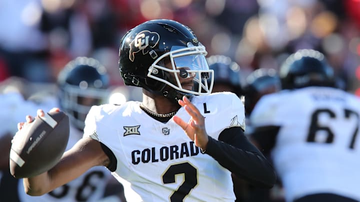 Nov 9, 2024; Lubbock, Texas, USA; Colorado Buffalos quarterback Shedeur Sanders (2) passes against the Texas Tech Red Raiders in the first half at Jones AT&T Stadium and Cody Campbell Field. Mandatory Credit: Michael C. Johnson-Imagn Images
