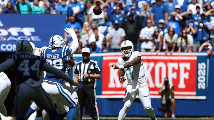 Miami Dolphins quarterback Tua Tagovailoa (1) throws during the first half against the Indianapolis Colts at Lucas Oil Stadium in the 2025 season opener.