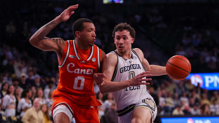 Mar 4, 2025; Atlanta, Georgia, USA; Miami Hurricanes guard Matthew Cleveland (0) defends Georgia Tech Yellow Jackets guard Lance Terry (0) in the second half at McCamish Pavilion. Mandatory Credit: Brett Davis-Imagn Images