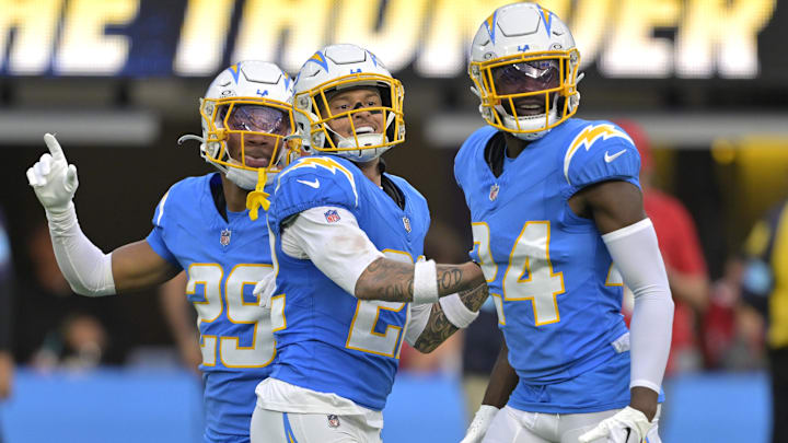 Los Angeles Chargers cornerback Elijah Molden celebrates with cornerback Tarheeb Still and defensive tackle Scott Matlock after a fumble recovery in the first half against the Tampa Bay Buccaneers at SoFi Stadium. Los Angeles Chargers cornerback Elijah Molden celebrates with cornerback Tarheeb Still and defensive tackle Scott Matlock after a fumble recovery in the first half against the Tampa Bay Buccaneers at SoFi Stadium.