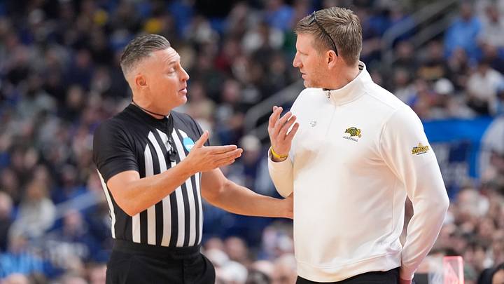 Mar 19, 2026; Buffalo, NY, USA; North Dakota State Bison head coach David Richman speaks to a referee during the first half against the Michigan State Spartans during a first round game of the men's 2026 NCAA Tournament at Keybank Center. Mandatory Credit: Gregory Fisher-Imagn Images
