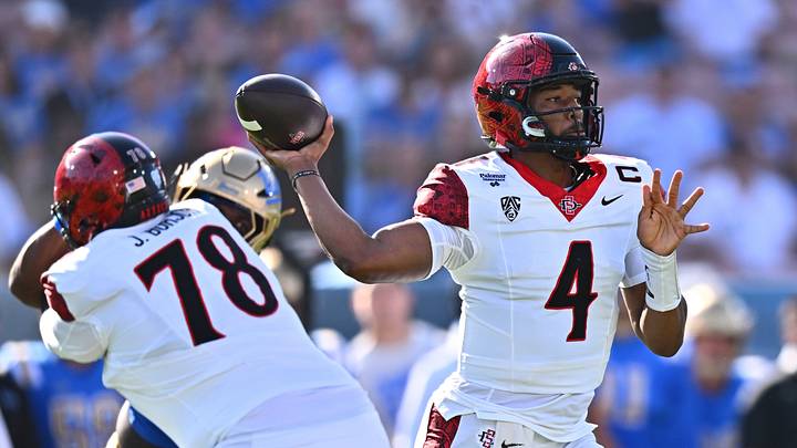 Sep 12, 2026; Pasadena, California, USA; San Diego State quarterback Jayden Denegal (4) throws during the first half against UCLA at the Rose Bowl. Sep 12, 2026; Pasadena, California, USA; San Diego State quarterback Jayden Denegal (4) throws during the first half against UCLA at the Rose Bowl.