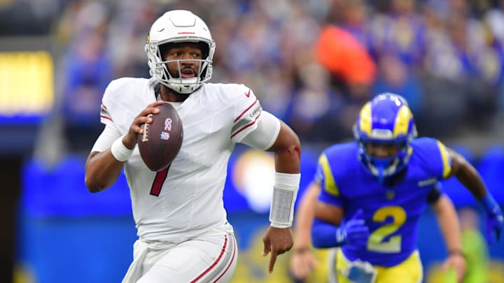 Jan 4, 2026; Inglewood, California, USA;  Arizona Cardinals quarterback Jacoby Brissett (7) carries the ball against the Los Angeles Rams during the first half at SoFi Stadium. Mandatory Credit: Gary A. Vasquez-Imagn Images