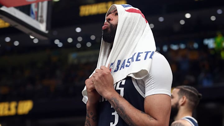 Apr 18, 2025; Memphis, Tennessee, USA; Dallas Mavericks forward Anthony Davis (3) reacts during a time out in the fourth quarter against the Memphis Grizzlies at FedExForum. Mandatory Credit: Petre Thomas-Imagn Images