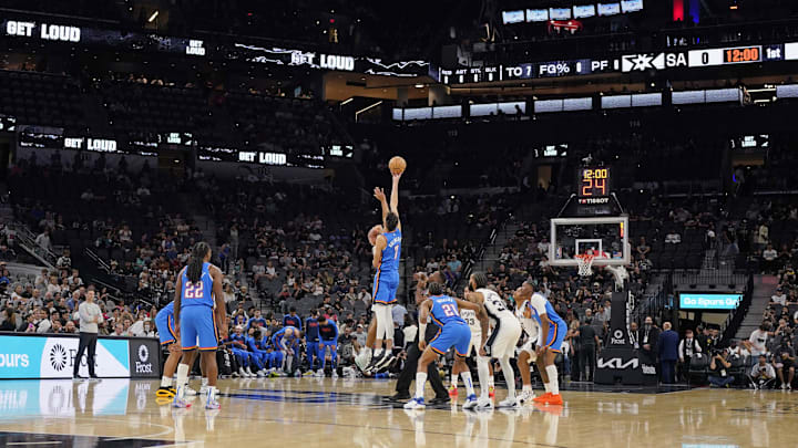 Oct 7, 2024; San Antonio, Texas, USA; Oklahoma City Thunder center Chet Holmgren (7) goes for the jump ball against San Antonio Spurs forward Jeremy Sochan (10) to start the game at Frost Bank Center. Oct 7, 2024; San Antonio, Texas, USA; Oklahoma City Thunder center Chet Holmgren (7) goes for the jump ball against San Antonio Spurs forward Jeremy Sochan (10) to start the game at Frost Bank Center.