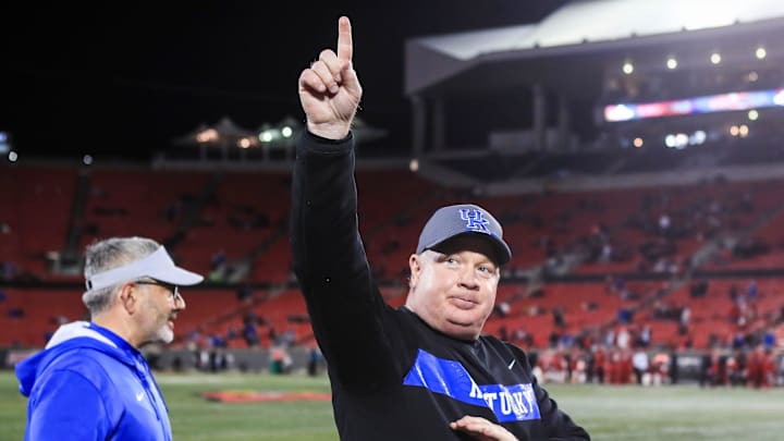 Kentucky's Mark Stoops acknowledges the crowd yelling \"Stoops\" after he helped coach  the Wildcats defeat Louisville 52-21 Saturday night. Nov. 27, 2021

Louisville Vs Kentucky 2021 Governors Cup