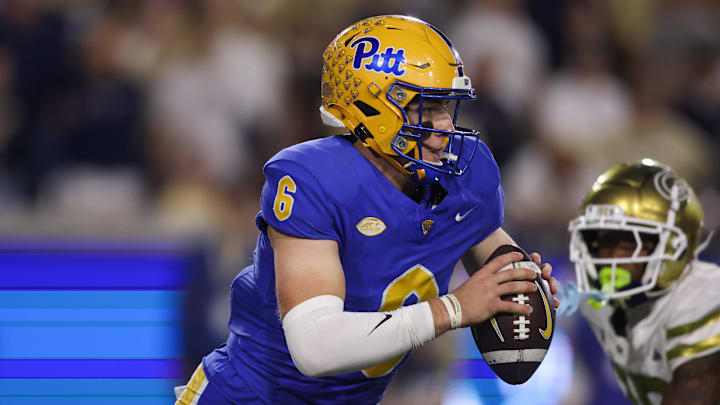 Nov 22, 2025; Atlanta, Georgia, USA; Pittsburgh Panthers quarterback Mason Heintschel (6) scrambles against the Georgia Tech Yellow Jackets in the fourth quarter at Bobby Dodd Stadium at Hyundai Field. Mandatory Credit: Brett Davis-Imagn Images