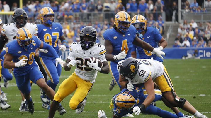 Running back Jaivian Thomas on his way to scoring a touchdown. Mandatory Credit: Charles LeClaire-Imagn Images