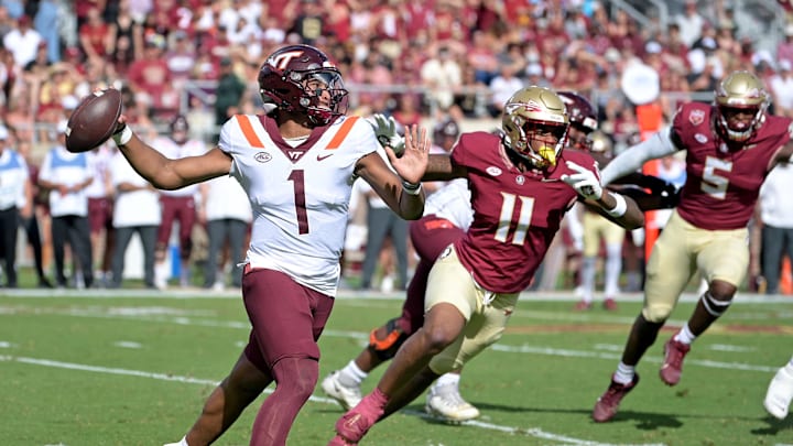 Oct 7, 2023; Tallahassee, Florida, USA; Virginia Tech Hokies quarterback Kyron Drones (1) looks to pass during the first half against the Florida State Seminoles at Doak S. Campbell Stadium. Mandatory Credit: Melina Myers-USA TODAY Sports