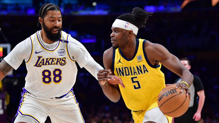 Feb 8, 2025; Los Angeles, California, USA; Indiana Pacers forward Jarace Walker (5) moves the ball against Los Angeles Lakers forward Markieff Morris (88) during the first half at Crypto.com Arena. Mandatory Credit: Gary A. Vasquez-Imagn Images Feb 8, 2025; Los Angeles, California, USA; Indiana Pacers forward Jarace Walker (5) moves the ball against Los Angeles Lakers forward Markieff Morris (88) during the first half at Crypto.com Arena. Mandatory Credit: Gary A. Vasquez-Imagn Images