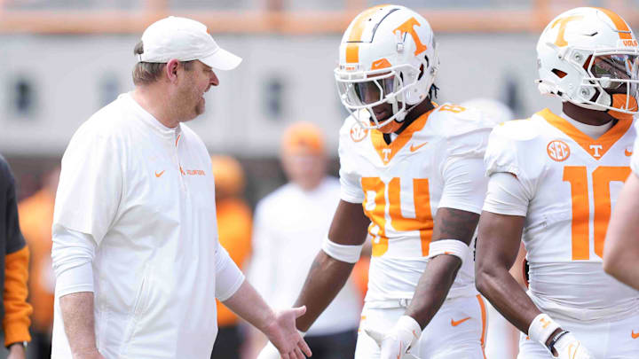 Tennessee head coach Josh Heupel greets players during warms up before the Orange & White spring game, Saturday, April 12, 2025.