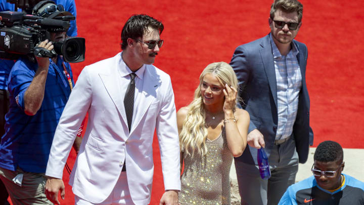 National League pitcher Paul Skenes of the Pittsburgh Pirates walks the red carpet with his girlfriend LSU gymnast Olivia Livvy Dunne before the 2024 MLB All-Star game at Globe Life Field on July 16.