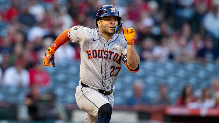 Sep 14, 2024; Anaheim, California, USA; Houston Astros second baseman Jose Altuve (27) runs to first duirng the 1st inning against the Los Angeles Angels at Angel Stadium. Mandatory Credit: Jason Parkhurst-Imagn Images Sep 14, 2024; Anaheim, California, USA; Houston Astros second baseman Jose Altuve (27) runs to first duirng the 1st inning against the Los Angeles Angels at Angel Stadium. Mandatory Credit: Jason Parkhurst-Imagn Images