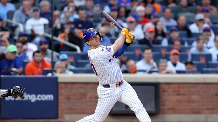 Oct 8, 2024; New York City, New York, USA; New York Mets first baseman Pete Alonso (20) hits a solo home run in the second inning against the Philadelphia Phillies during game three of the NLDS for the 2024 MLB Playoffs at Citi Field. Mandatory Credit: Brad Penner-Imagn Images Oct 8, 2024; New York City, New York, USA; New York Mets first baseman Pete Alonso (20) hits a solo home run in the second inning against the Philadelphia Phillies during game three of the NLDS for the 2024 MLB Playoffs at Citi Field. Mandatory Credit: Brad Penner-Imagn Images