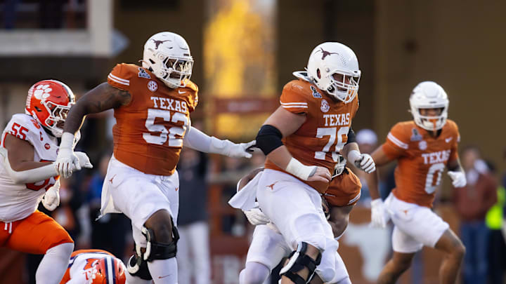 Dec 21, 2024; Austin, Texas, USA; Texas Longhorns offensive lineman DJ Campbell (52) and Hayden Conner (76) against the Clemson Tigers during the CFP National playoff first round at Darrell K Royal-Texas Memorial Stadium. Mandatory Credit: Mark J. Rebilas-Imagn Images