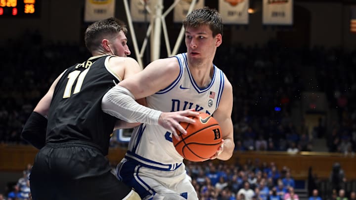 Feb 12, 2024; Durham, North Carolina, USA;  Duke Blue Devils center Kyle Filipowski (30) spins to