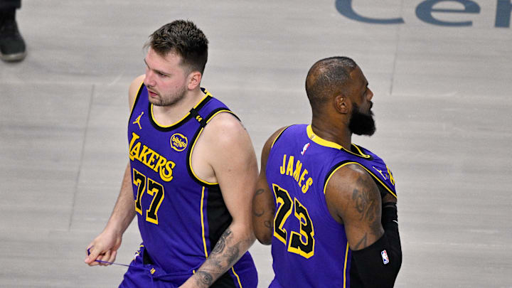 Apr 9, 2025; Dallas, Texas, USA; Los Angeles Lakers guard Luka Doncic (77) and forward LeBron James (23) during the game between the Dallas Mavericks and the Los Angeles Lakers at American Airlines Center. Mandatory Credit: Jerome Miron-Imagn Images
