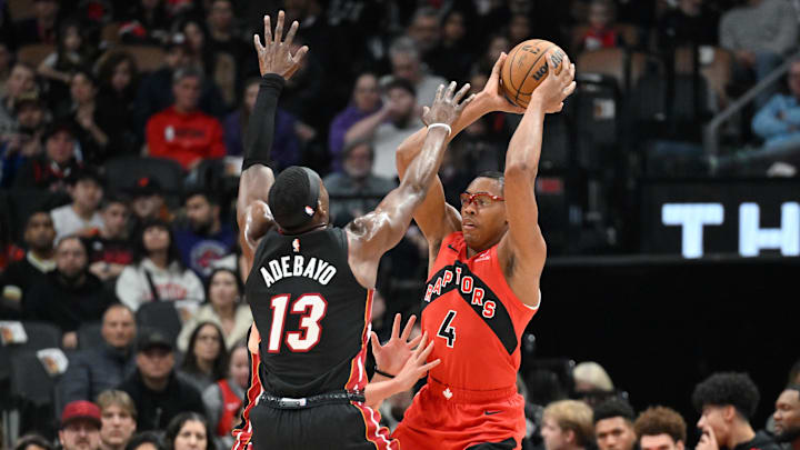 Dec 1, 2024; Toronto, Ontario, CAN; Toronto Raptors forward Scottie Barnes (4) looks to make a pass as Miami Heat forward Bam Adebayo (13) defends in the first half at Scotiabank Arena. Mandatory Credit: Dan Hamilton-Imagn Images Dec 1, 2024; Toronto, Ontario, CAN; Toronto Raptors forward Scottie Barnes (4) looks to make a pass as Miami Heat forward Bam Adebayo (13) defends in the first half at Scotiabank Arena. Mandatory Credit: Dan Hamilton-Imagn Images
