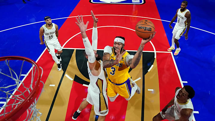 Dec 7, 2023; Las Vegas, Nevada, USA; Los Angeles Lakers forward Anthony Davis (3) shoots the ball the New Orleans Pelicans center Jonas Valanciunas (17) in the NBA In Season Tournament Semifinal at T-Mobile Arena. Mandatory Credit: Kyle Terada-Imagn Images