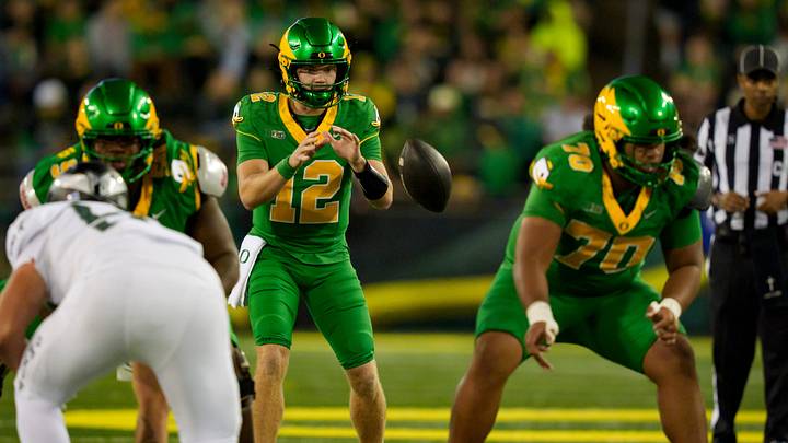 Oregon quarterback Brock Thomas takes a snap as the Oregon Ducks host the Portland State Vikings on Sept. 18, 2026, at Autzen Stadium in Eugene, Oregon.