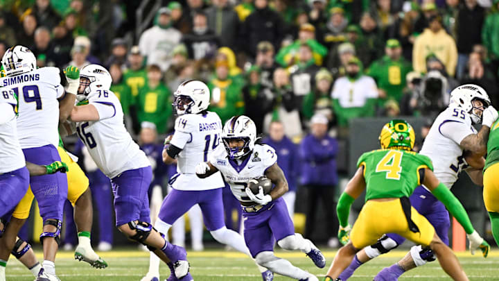Dec 20, 2025; Eugene, OR, USA; James Madison Dukes running back Wayne Knight (3) rushes during the third quarter against the Oregon Ducks at Autzen Stadium. Mandatory Credit: Craig Strobeck-Imagn Images