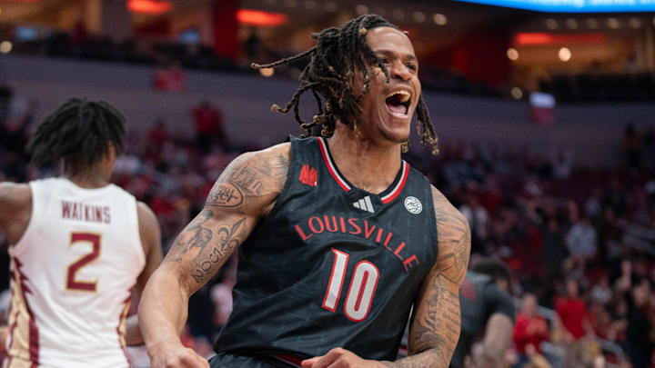 Louisville Cardinals forward Kaleb Glenn (10) celebrates after his basket during their game against