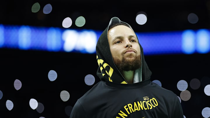 Golden State Warriors guard Stephen Curry (30) looks into the crowd during a timeout as the Warriors plays against the Charlotte Hornets during the second half at Spectrum Center.