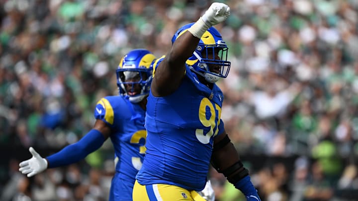 Sep 21, 2025; Philadelphia, Pennsylvania, USA; Los Angeles Rams defensive end Kobie Turner (91) reacts against the Philadelphia Eagles during the first half at Lincoln Financial Field. Mandatory Credit: Eric Hartline-Imagn Images Sep 21, 2025; Philadelphia, Pennsylvania, USA; Los Angeles Rams defensive end Kobie Turner (91) reacts against the Philadelphia Eagles during the first half at Lincoln Financial Field. Mandatory Credit: Eric Hartline-Imagn Images