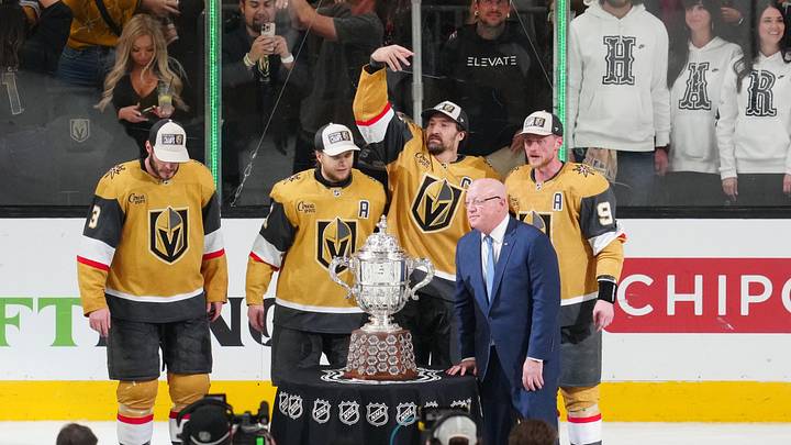 May 26, 2026; Las Vegas, Nevada, USA; Vegas Golden Knights are presented with the Clarence S. Campbell Bowl by Deputy Commissioner of the NHL Bill Daly after winning against the Colorado Avalanche in game four of the Western Conference Final of the 2026 Stanley Cup Playoffs at T-Mobile Arena. Mandatory Credit: Stephen R. Sylvanie-Imagn Images