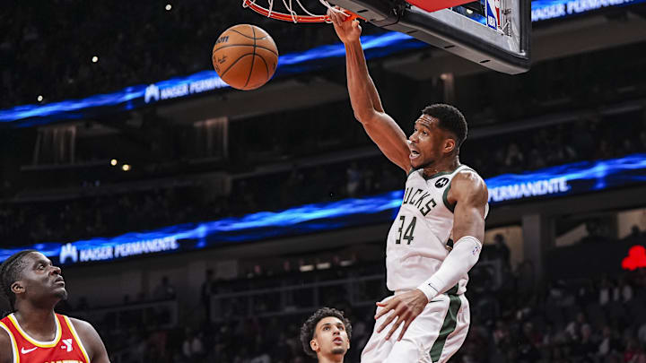 Mar 4, 2025; Atlanta, Georgia, USA; Milwaukee Bucks forward Giannis Antetokounmpo (34) dunks the ball against the Atlanta Hawks during the first half at State Farm Arena. Mandatory Credit: Dale Zanine-Imagn Images