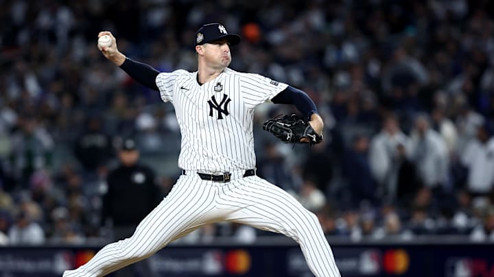 Oct 28, 2024; New York, New York, USA; New York Yankees pitcher Clay Holmes (35) throws during the eighth inning against the Los Angeles Dodgers in game three of the 2024 MLB World Series at Yankee Stadium. Mandatory Credit: Wendell Cruz-Imagn Images