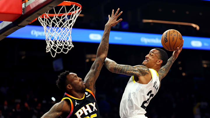 Feb 8, 2024; Phoenix, Arizona, USA; Utah Jazz forward John Collins (20) dunks the ball against Phoenix Suns forward Nassir Little (25) during the second quarter at Footprint Center. Mandatory Credit: Mark J. Rebilas-Imagn Images Feb 8, 2024; Phoenix, Arizona, USA; Utah Jazz forward John Collins (20) dunks the ball against Phoenix Suns forward Nassir Little (25) during the second quarter at Footprint Center. Mandatory Credit: Mark J. Rebilas-Imagn Images
