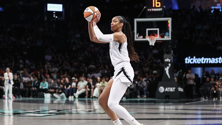 A'ja Wilson takes a three-pointer against the Liberty.