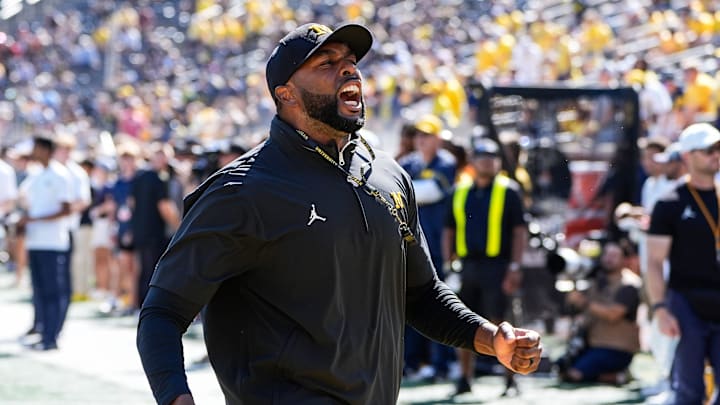 Michigan head coach Sherrone Moore hype the student section during warm up before the USC game at Michigan Stadium in Ann Arbor on Saturday, Sept. 21, 2024. Michigan head coach Sherrone Moore hype the student section during warm up before the USC game at Michigan Stadium in Ann Arbor on Saturday, Sept. 21, 2024.